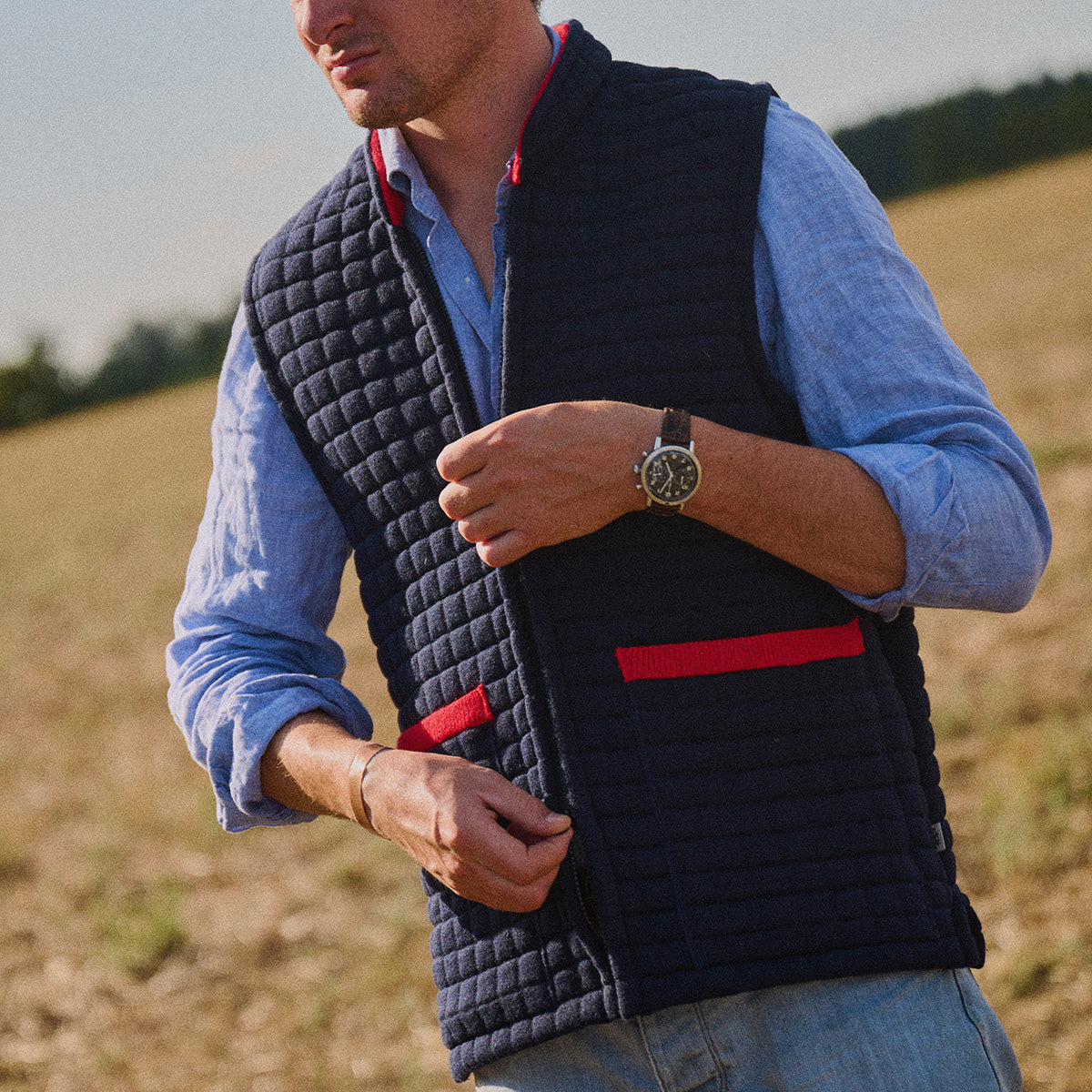 Thermatex Unisex Gilet in Navy & Red worn outdoors
