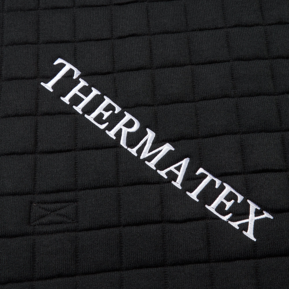Thermatex Original Cooler Rug in Black with white binding, close-up of embroidery