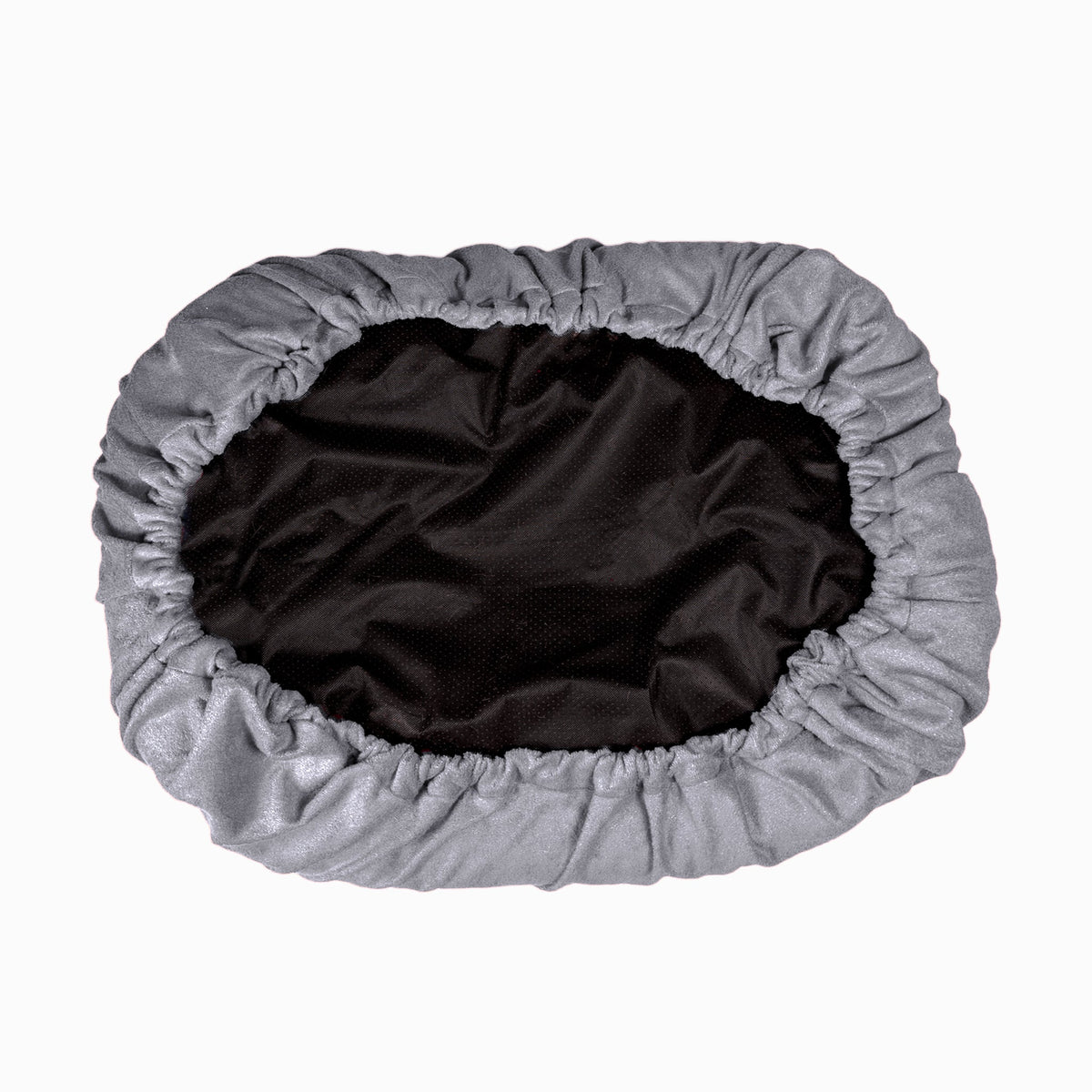 The underside of a grey NASH bamboo dog bed cover.