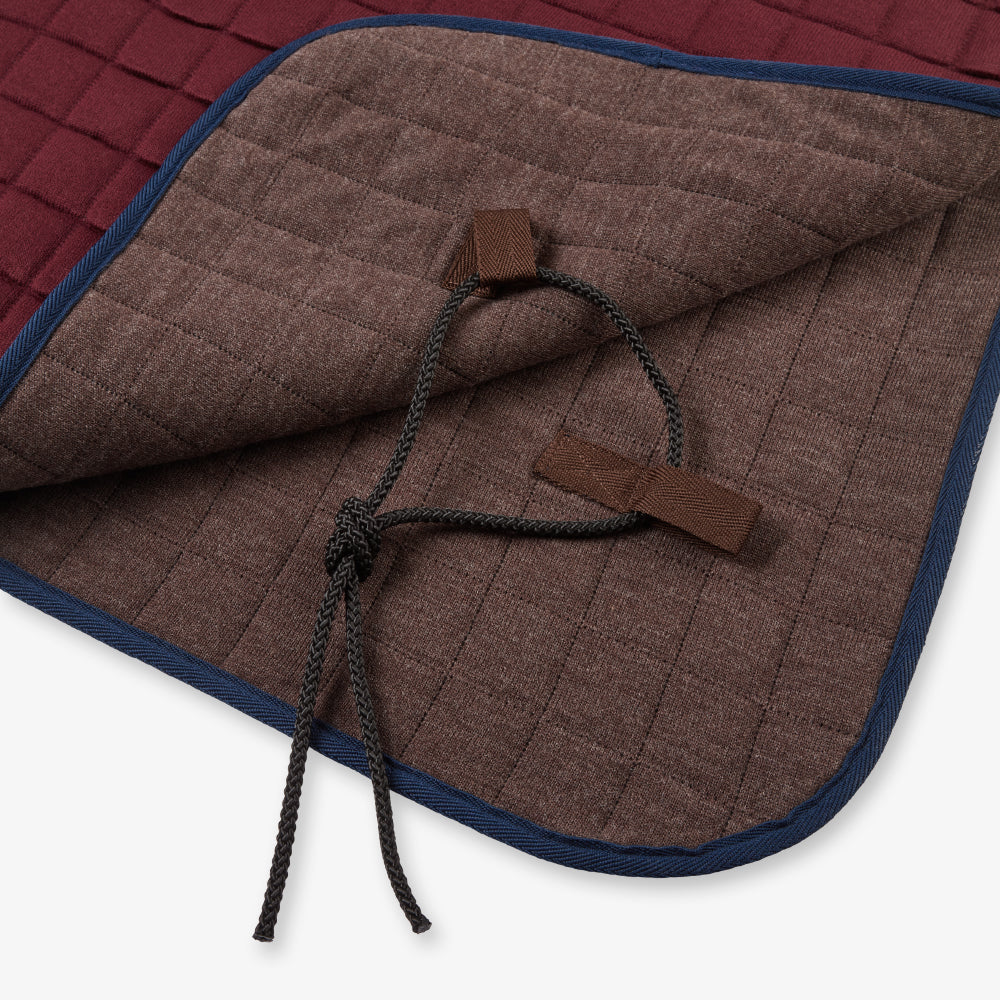 Thermatex Original Cooler Rug in Claret with navy binding, close-up of tail straps