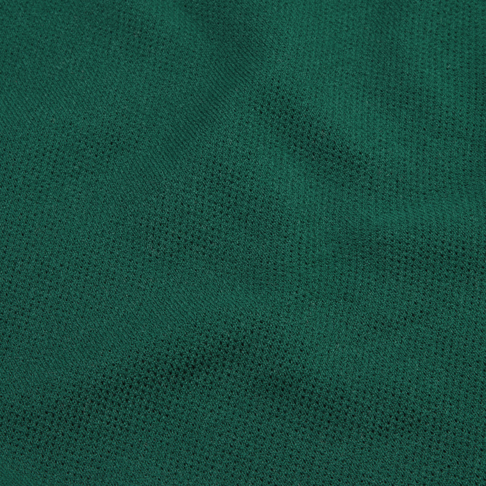 Thermatex Lightweight Cooler Rug in Bottle Green with dark green binding, close-up of label